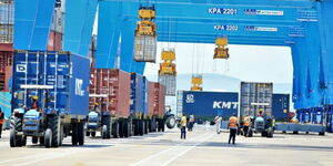 Port officials overseeing the unloading of containers at the Port of Mombasa on October 14, 2023.
