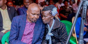 Moses Kuria and Pauline Njoroge (Mama Mboga) speak during a funeral on April 3