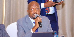 CS Moses Kuria addressing government officials at a meeting on February 27, 2024.