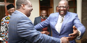 President William Ruto embracing Prime CS Musalia Mudavadi as Nandi Senator Samson Cherargei and former Captain Kung'u Muigai watches on, in an image taken on August 15, 2022