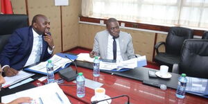 Transport CS Kipchumba Murkomen (left) and Nairobi Governor Johnson Sakaja during a council meeting on Thursday, May 18, 2023. 