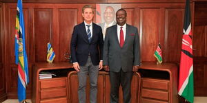 Prime Cabinet Secretary Musalia Mudavadi and the Denmark Ambassador to Kenya H.E. Amb. Stephan Schønemann at a meeting held in Nairobi on March 8