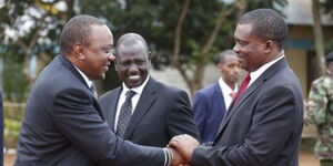 President Uhuru Kenyatta shaking hands with National Assembly Speaker Justin Muturi while in the company of Deputy President William Ruto at a past event.