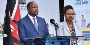 Health Cabinet Secretary Mutahi Kagwe (Left) and his Chief Administrative Secretary Mercy Mwangangi during a press briefing in March 2020.