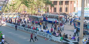 Kenyans trekking along Moi Avenue in Nairobi Central Business District (CBD).