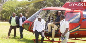 Nairobi Governor Johnson Sakaja alights from a helicopter