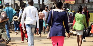 Residents walking in Nairobi Central Business District on Wednesday, 18 May 2022