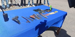 Items recovered including toy guns, Knives and phones by the police during the raid