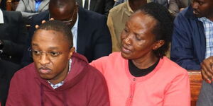 Blogger and activist Ndiangui Kinyagia at the Milimani Law Courts, flanked by his mother, on July 7, 2025.
