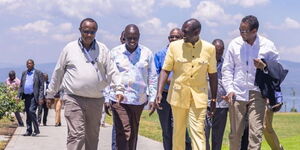 President William Ruto (centre), his deputy Rigathi Gachagua (second from left) and economic advisor David Ndii (left) engage in discussions during a retreat in Naivasha on February 21, 2024.