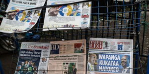 Newspapers from different media houses in Kenya placed on a vending stand