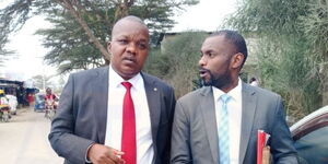 Kitui East MP Nimrod Mbai (left) with his lawyer as he leaves Kitengela police station on Wednesday afternoon, July 5, 2023. 