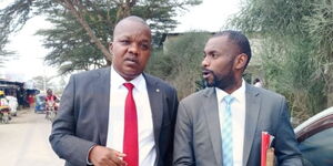 Kitui East MP Nimrod Mbai (left) with his lawyer as he leaves Kitengela police station on Wednesday afternoon, July 5, 2023. 