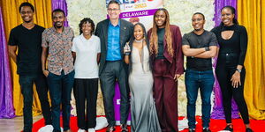 Kirinyaga Woman Representative Njeri Maina (centre in dress) poses for a photo after being honoured with the Champion For Justice Award by the Delaware community in the US on Tuesday, October 7, 2025.
