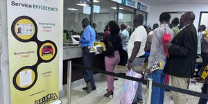 Kenyans lining up inside the National Transport and Safety Authority (NTSA) office in Nairobi in 2024.