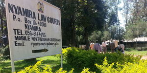 A signpost showing the Nyamira law courts
