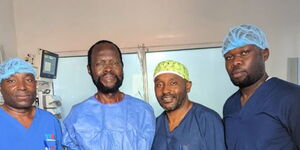 Kisumu governor Anyang' Nyong'o (second from left) poses for a photo alongside Jaramogi Oginga Odinga Teaching and Referral Hospital staff on July 14, 2023. 