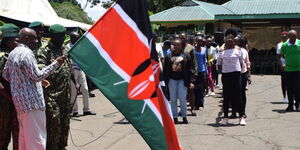 Labour PS Shadrack Mwadime flagging off first batch of NYS graduates to Saudi Arabia on March 2, 2024