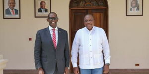 A photo of former State House Chief of Staff Nzioka Waita and former president Uhuru Kenyatta at State House on February 9, 2022. 