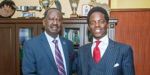 ODM leader Raila Odinga and  ODM Youth League leaders, Kasmuel McOure posing for a photo on October 7, 2024 