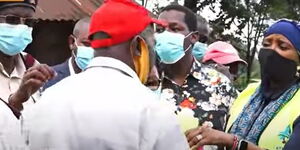 CS Amina Mohammed interacting with a resident in Murang'a County on February 16, 2021.