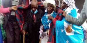 Mzee John Kimeli Yama and his wife Mary Chemesunde during the ceremony on Friday, October 23