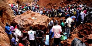 Residents of Abimbo Village in Bondo Subcounty at the site of the collapsed mine on Tuesday, December 2