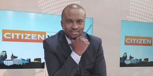 A photo of Citizen TV news anchor Wycliffe Orandi posing for a photo inside the station's studios in 2019.