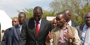 Deputy President William Ruto together with ICT CS Joe Mucheru at a past event.