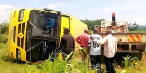 A bus belonging to Kasima Mixed Secondary that overturned at the UCI Cell in Osukuru Town Council near the Uganda-Kenya border while ferrying pilgrims from Namugongo on June 4, 2025