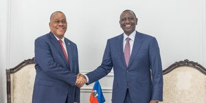 Ousted Haiti PM Garry Conille (left) greets President William Ruto during a meeting in October.