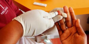 Photo of a patient during a blood test.