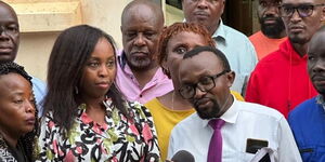Pauline Njoroge and her lawyer (in white shirt) address the media outside Malindi Law Courts on Monday, July 24, 2023.