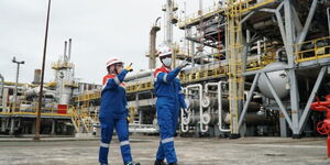 Pertamina president director Nicke Widyawati (left) and Industry Minister Agus Gumiwang Kartasasmita (right) visit the Dumai refinery in Riau on July 17, 2023 