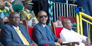 Kenya's Deputy President Rigathi Gachagua (left) seated next to Paul Kagame (middle) and Uganda's President Yoweri Museveni during the 60th Anniversary celebration of the Zanzibar Revolution held on January 12, 2024