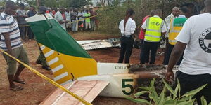 Part of the wreckage of the plane in Voi, Taita Taveta County, as firefighters work to stop the fire, March 8, 2025.