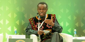 PLO Lumumba speaks at a panel discussion in Rwanda in May 2023.