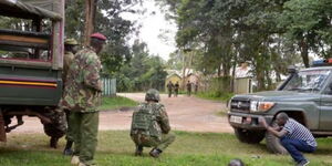 Police officers responding to a shootout in Kapenguria Police Station.