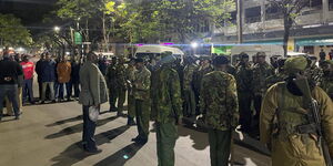 A photo of police officers conducting a raid on nightclubs at City Hall in Nairobi in November 2022. 