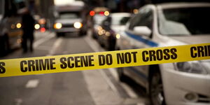 A photo of a crime scene yellow tape. 