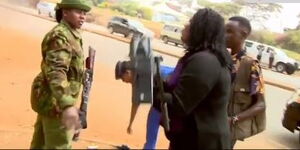 Photo of police officers harassing journalists covering Lang'ata demos on Wednesday, September 20