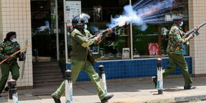 Anti-riot officers lob teargas at protestors on Monday, March 20, 2023.