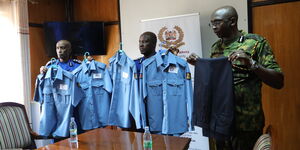 Police officers presenting the proposed uniforms for officers under the National Police Service (NPS) on August 29, 2023.