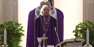 Pope Francis celebrates Mass on March 12, 2020, in the chapel of his Vatican residence, the Domus Sanctae Marthae. 