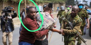 Police officer masquerading as journalist arrest protester on Wednesday, July 12th