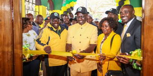 President William Ruto (center) and his deputy Rigathi Gachagua (left) at UDA offices in Nyeri.