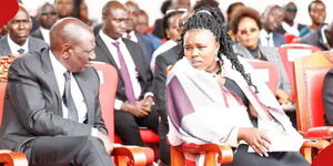 President William Ruto (left) and Kelvin Kiptum's widow Asenath Kiprotich during the athlete's burial ceremony.