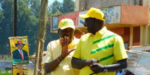 President William Ruto (right) and former Bahati MP Kimani Ngunjiri on a campaign rally trail in Nakuru.