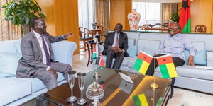 President William Ruto (right) and Raila Odinga (right) meet President Umaro Sissoco Embaló of Guinea-Bissau in China.