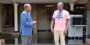 President William Ruto (right) and former Treasury CS Njuguna Ndung'u in April 2021.